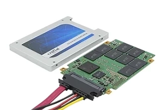 SSD with visible circuit board and data storage chips.