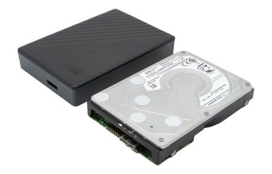 External hard drive with removed cover showing internal disk and components.