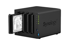 Synology NAS device with multiple drive bays, one drive partially inserted